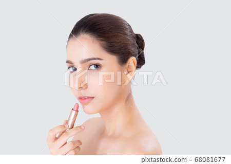 Beauty portrait young asian woman applying makeup with lipstick of mouth isolated on white. Beauty portrait young asian woman applying makeup with lipstick of mouth isolated on white. 68081677