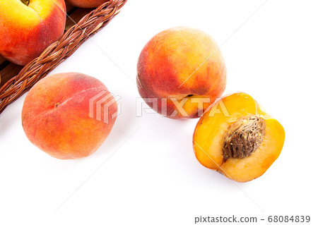 Whole and half of ripe peach fruit and several in Whole and half of ripe peach fruit and several in 68084839