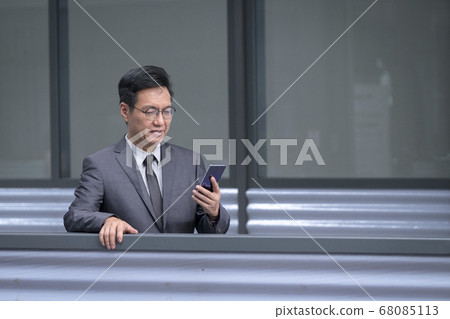 Chinese businessman in business suit and tie 68085113