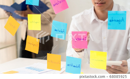 Creative group of business people brainstorming Creative group of business people brainstorming 68085925