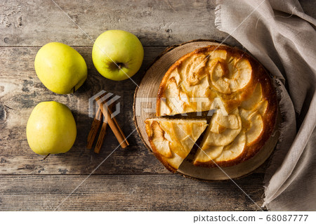 Homemade slice apple pie on wooden table. Top view. Copy space Homemade slice apple pie on wooden table. Top view. Copy space 68087777