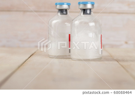 Various pill bottles and different pills on wooden table Various pill bottles and different pills on wooden table 68088464