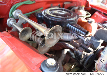 Classic car parts repair with trumpet Classic car parts repair with trumpet 68089227