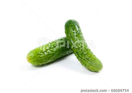 Fresh green cucumber on the white background. 68089754