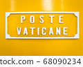 Yellow post box in Vatican 68090234