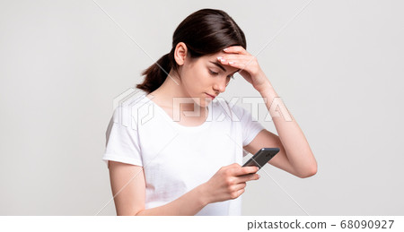 social media anxiety troubled woman smartphone 68090927
