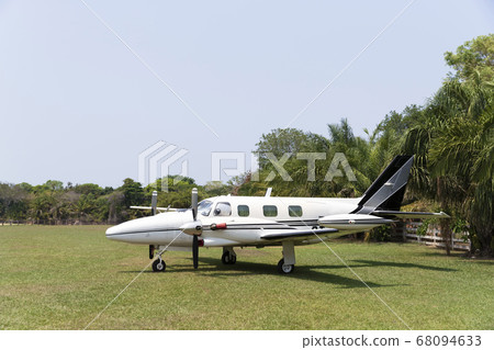 Close up of a small two-engine plane Close up of a small two-engine plane 68094633
