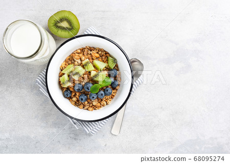 Healthy breakfast cereals granola with fruits 68095274