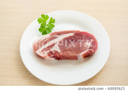 Close up of a plate of pork on the weight scale Stock Photo - Alamy