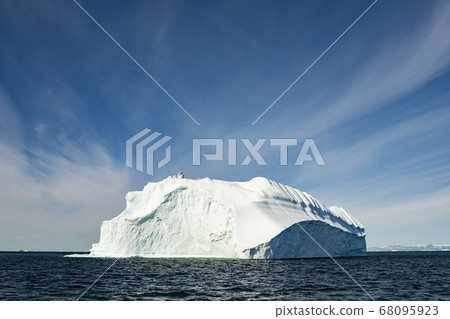 Iceberg from glacier in arctic nature landscape on Greenland. Icebergs in Ilulissat icefjord. Affected by climate change and global warming 68095923