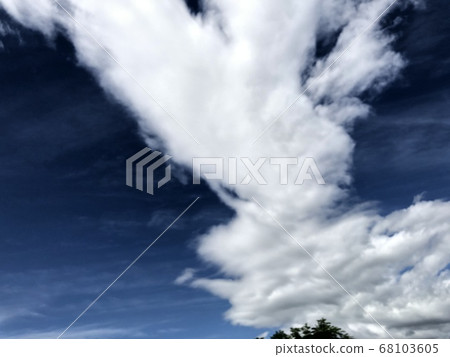 Clouds melting in the blue sky Clouds melting in the blue sky 68103605