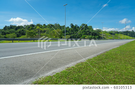 Perspective view of empty highway road Perspective view of empty highway road 68105313
