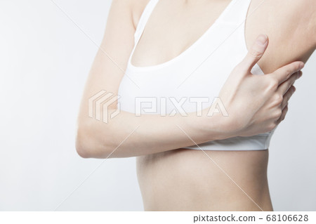 Woman doing bust-up massage Woman doing bust-up massage 68106628