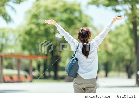Deep breathing business woman 68107151