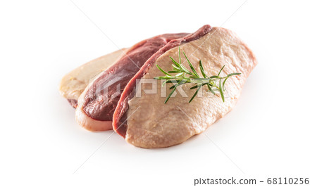 Duck breast with rosemary isolated on white Duck breast with rosemary isolated on white 68110256