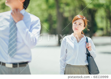 Business woman and businessman 68110999