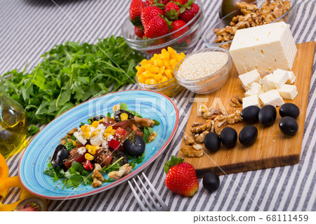 Rocket salad with ingredients Rocket salad with ingredients 68111459
