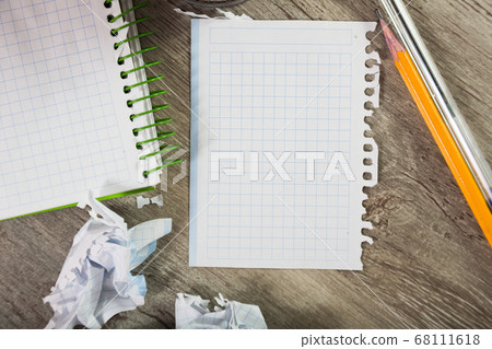 Torn crumpled notebook sheet Torn crumpled notebook sheet 68111618