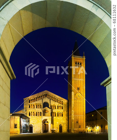 Baptistery and cathedral of Parma illuminated at evening Baptistery and cathedral of Parma illuminated at evening 68111632