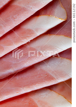 Sliced appetizing ham closeup wooden board Sliced appetizing ham closeup wooden board 68112192