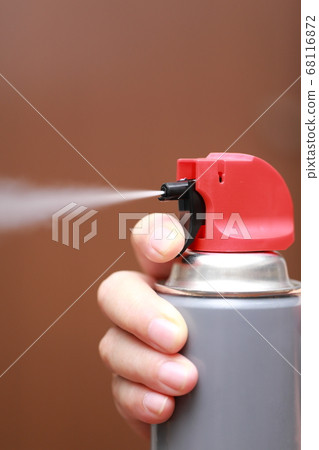 Senior finger spraying a spray can Senior finger spraying a spray can 68116872