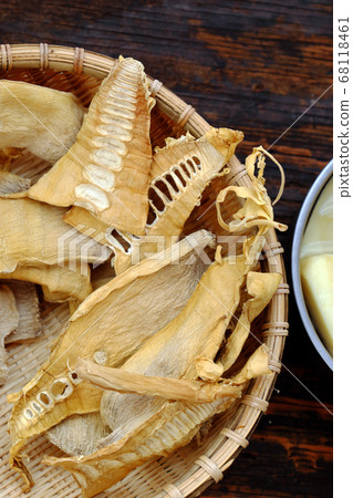 Top view dried bamboo shoots, raw material for many Vietnamese vegan food Top view dried bamboo shoots, raw material for many Vietnamese vegan food 68118461