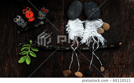 love concept background, couple skeleton sit on branch of tree, head from pebble, happy fall in love 68118521