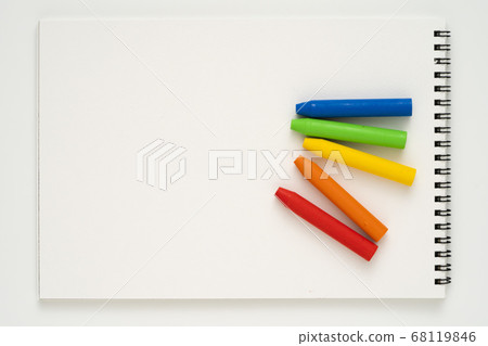 Crayons placed in a sketchbook Crayons placed in a sketchbook 68119846