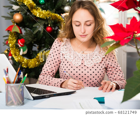 Woman working with laptop Woman working with laptop 68121749