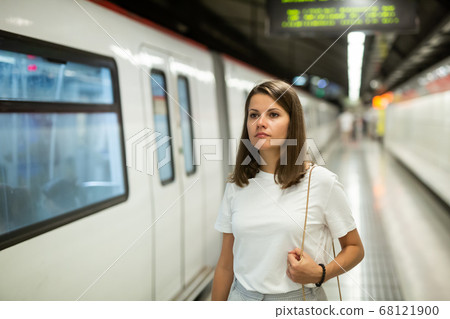 Woman on subway station Woman on subway station 68121900
