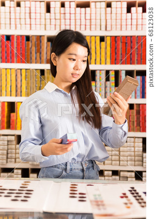 Female customer choosing hair dye 68123038