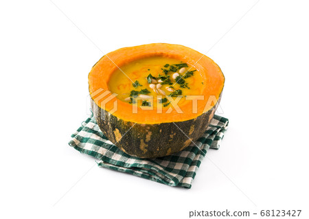 Pumpkin and carrot soup isolated on white background. Autumn food. 68123427