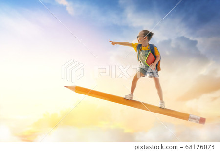 child flying on a pencil child flying on a pencil 68126073