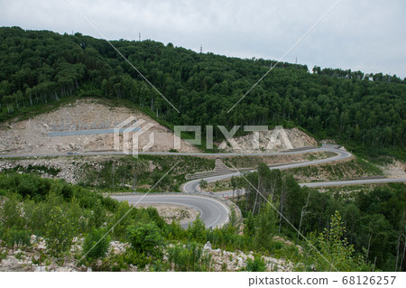 Winding road in the mountains Winding road in the mountains 68126257