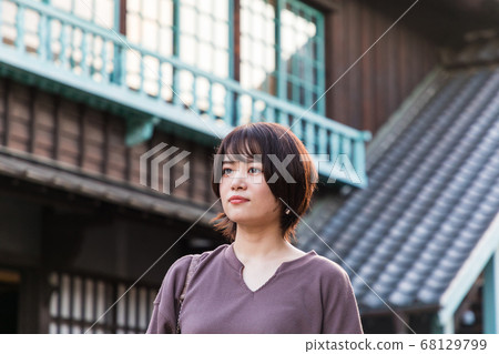 Young woman sightseeing in Nagasaki Dejima Young woman sightseeing in Nagasaki Dejima 68129799