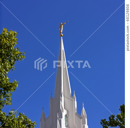 Sculpture of angel moroni atop of a Mormon 68129808