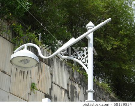 Street lighting during daytime. Purpose to provide light at night to the roads or building compound.  68129834