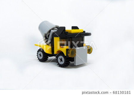 Small model of Construction Mixer Lorry made of plastic bricks isolated on white background. 68130181