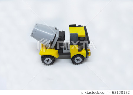 Small model of Construction Mixer Lorry made of plastic bricks isolated on white background. 68130182