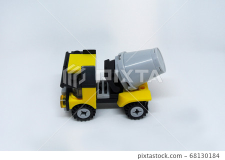 Small model of Construction Mixer Lorry made of plastic bricks isolated on white background. 68130184