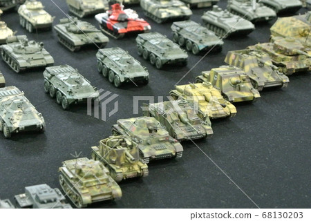 KUALA LUMPUR, MALAYSIA -NOVEMBER 26, 2017: Selected focused of small model of army tanks. It was the collector items display on a desk. KUALA LUMPUR, MALAYSIA -NOVEMBER 26, 2017: Selected focused of small model of army tanks. It was the collector items display on a desk. 68130203