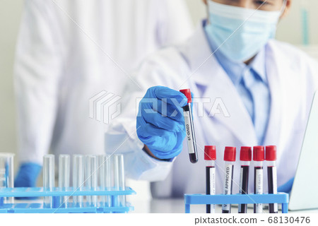 Scientist covid-19 virus antibody sample in Scientist covid-19 virus antibody sample in 68130476
