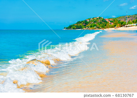 Blue sea waves and sand beach Blue sea waves and sand beach 68130767