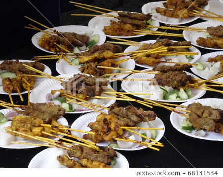 Malaysian famous traditional food called sate. Meat or chicken marinate with mix spices and grill using hot charcoal.   68131534
