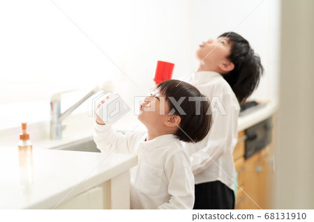 Two boys gargling side by side Two boys gargling side by side 68131910