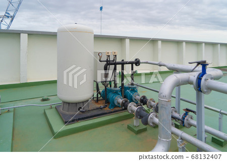 Chiller tower or cooling tower on rooftop of a Chiller tower or cooling tower on rooftop of a 68132407