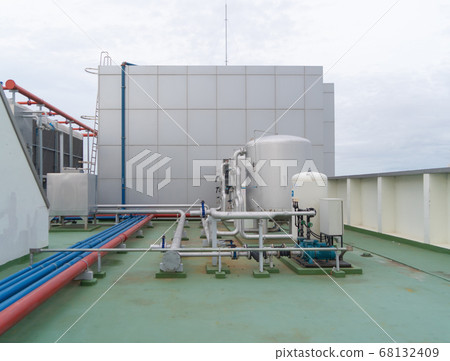 Chiller tower or cooling tower on rooftop of a Chiller tower or cooling tower on rooftop of a 68132409