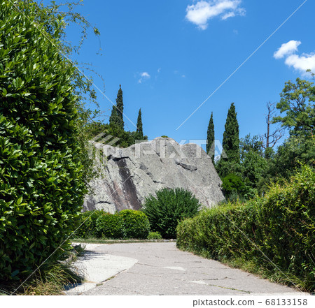 Lump of gabbro diabase - stone, tourist attraction in Vorontsovsky Park, Crimea 68133158