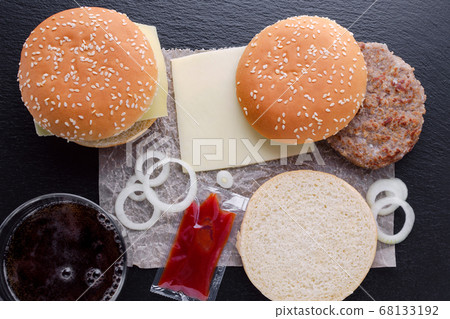 preparation of homemade burger on black background, flat lay 68133192