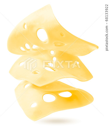 Pieces of cheese are flying in the air on a white 68133922